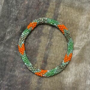 💚🧡Handcrafted Green and Orange Beaded Bracelet